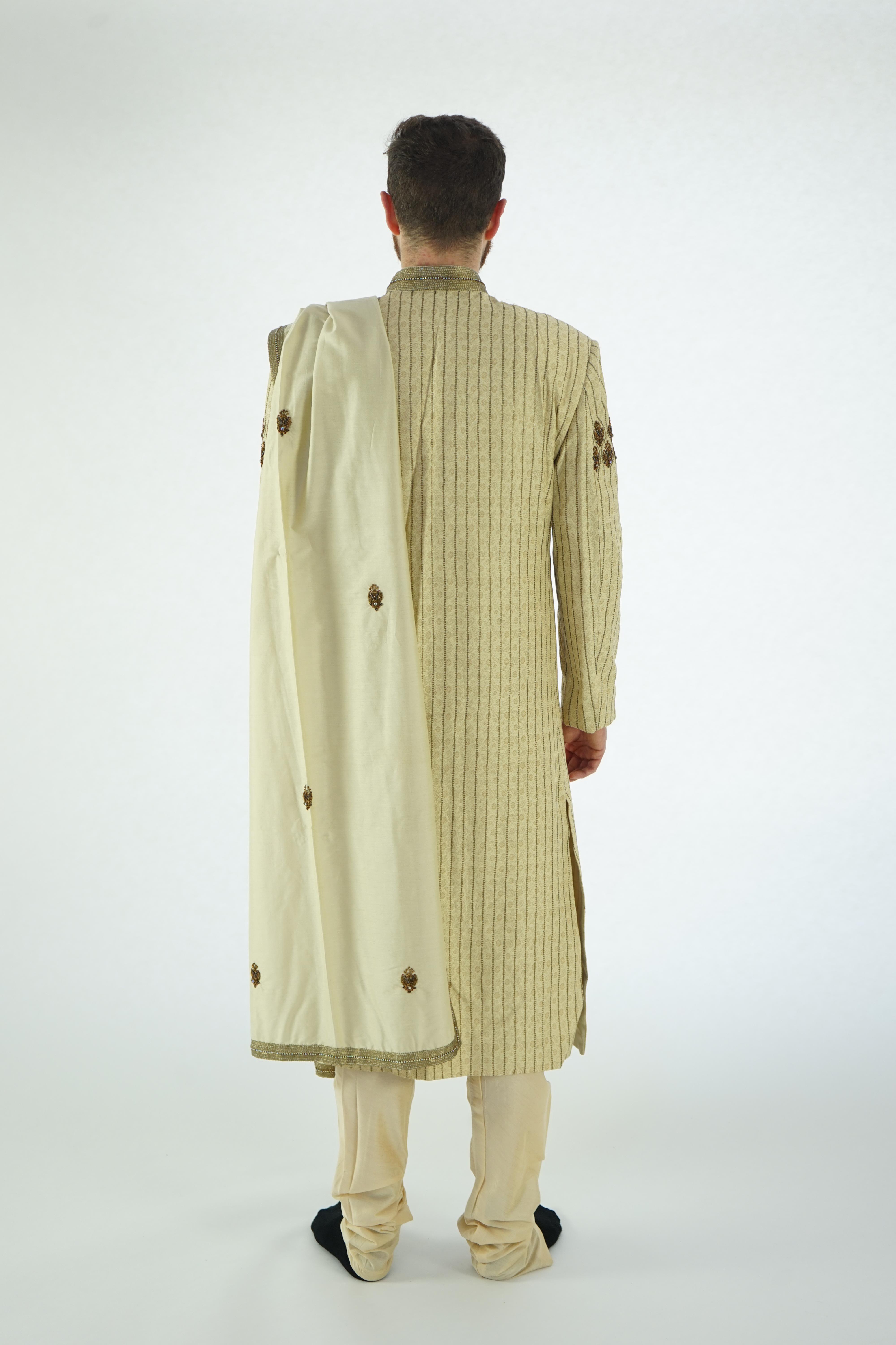 A modern Indian Men's wedding frock coat and trousers. Ex London Festival Opera - 'The Magic Flute'